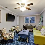 Vibrant, Colorful Condo Building With Backyard Firepit And Games