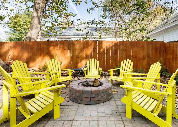 Vibrant, Colorful Condo Building With Backyard Firepit And Games