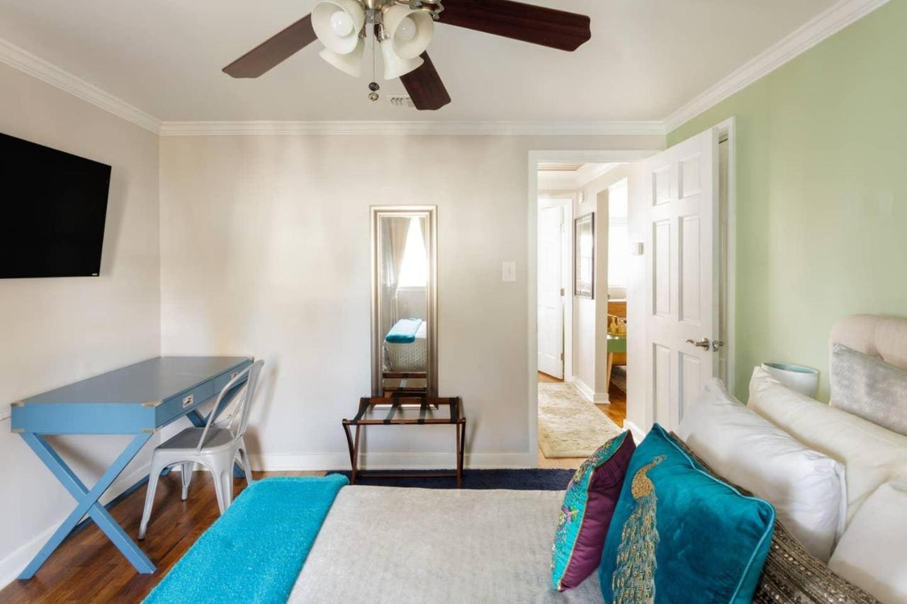 Vibrant, Colorful Building With Backyard Firepit And Games Savannah